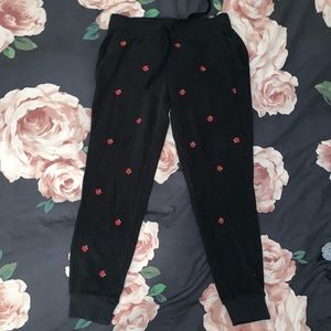 victoria secret black sweatpants with black roses